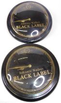 Assorted whisky advertising wares to include two Johnnie Walker Black Label wall clocks, White Horse