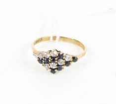 A 9ct gold, blue and white sapphire lozenge cluster ring, 1.8g, size P