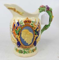 A Crown Devon Fieldings George VI coronation commemorative pottery jug, with music box to the