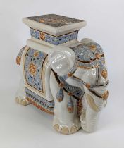 A glazed pottery model of an elephant, h.42cm