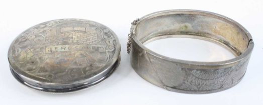 A lady's white metal souvenir powder compact from Jerusalem, dia.6cm; together with a white metal