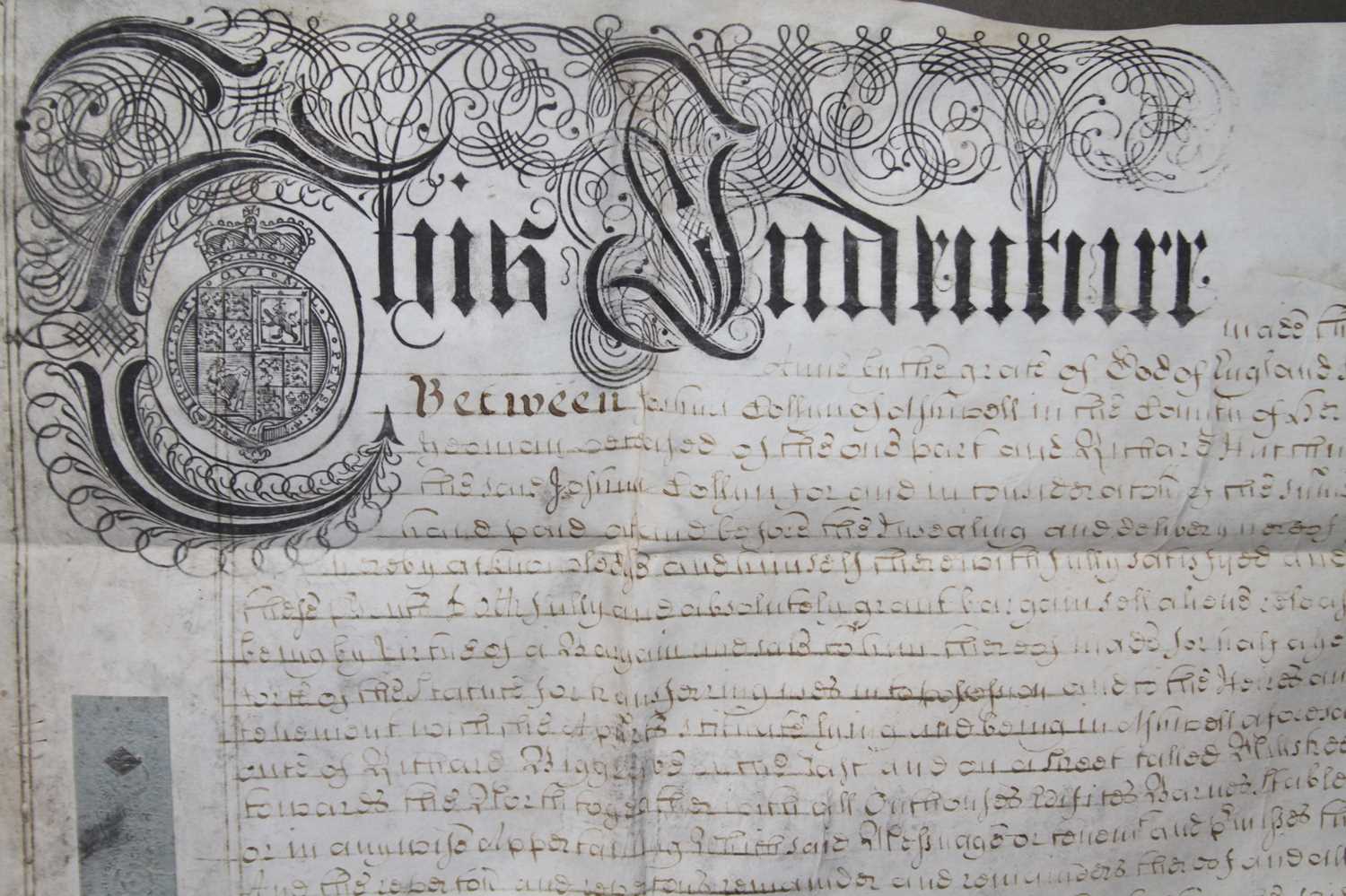 An early 18th century handwritten indenture dated 1704, in a glazed frame, indenture measures - Image 2 of 2