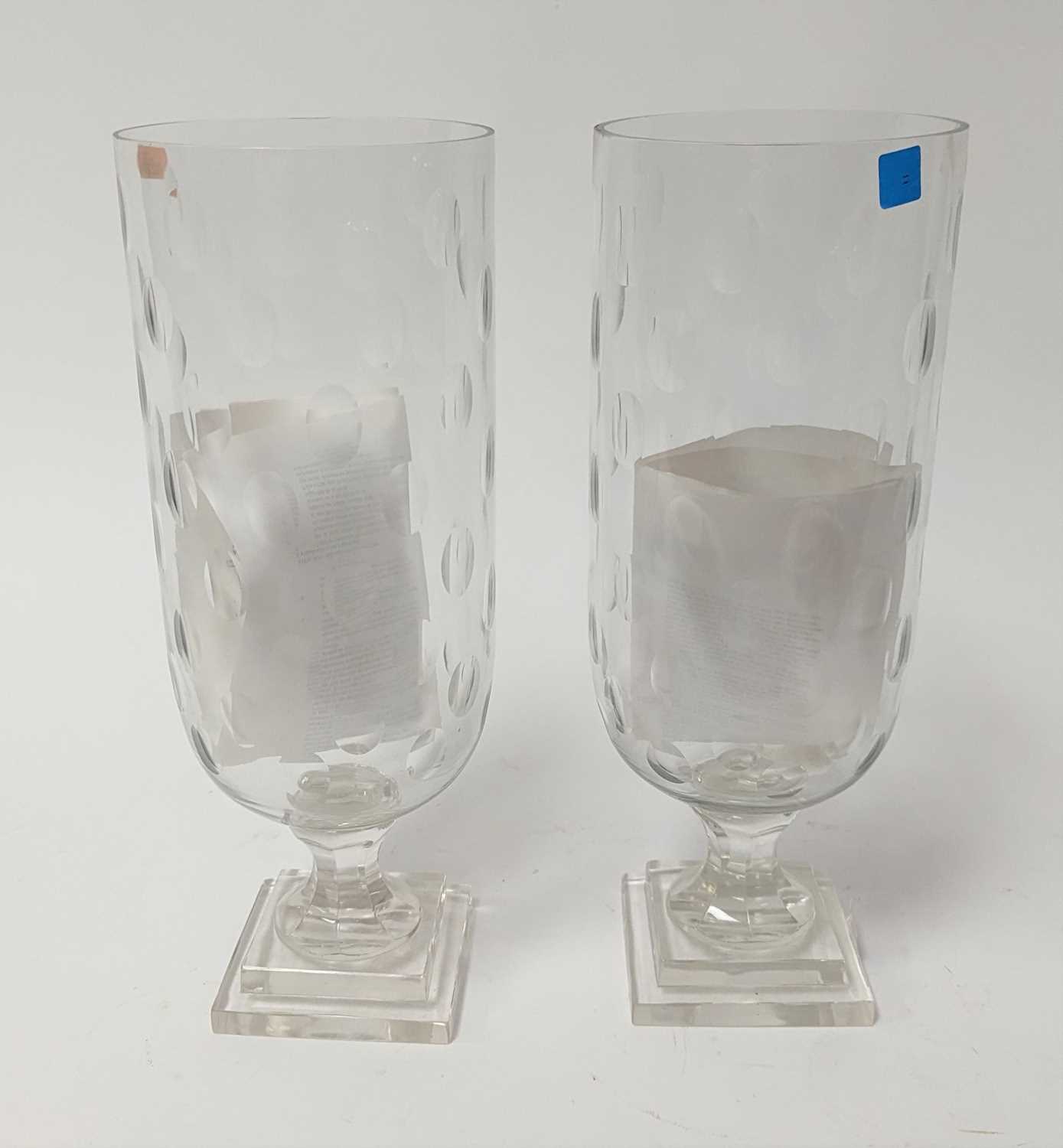 A pair of cut glass hurricane lamps, h.39cm