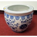 A Chinese blue & white porcelain jardiniere, decorated with flowers, height 31cm