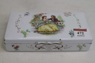 A Bilston enamel table cigarette box, the exterior decorated with a courting couple having a cedar