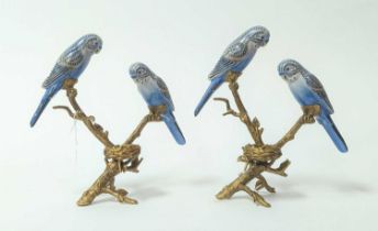 A pair of brass and porcelain table candlesticks, each in the form of a perching bird, h.25cm