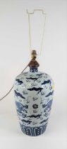 A Chinese blue & white porcelain table lamp, underglaze decorated with a pair of five claw dragons