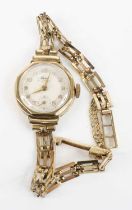 A lady's Avia 9ct gold cased manual wind wristwatch, on 9ct gold gatelink bracelet, 13.8g, case