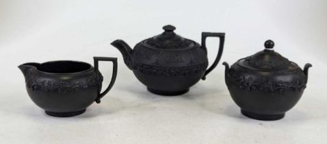 A Wedgwood and Prinknash matched three-piece tea service, relief decorated with classical figures