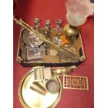 A collection of metalware, to include brass oil lamp, fire tools, and silver plated entree dish