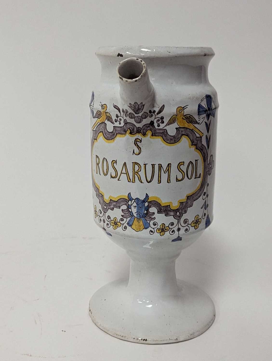 A 19th century polychrome tin-glazed wet drugs jar, inscribed Rosarum Sol within a cartouche, h. - Image 2 of 3