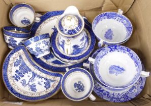 A collection of Willow pattern transfer decorated blue and white tableware, to include Spode and