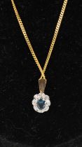 A pair of 9ct gold blue zircon set ear studs, with matching pendant on finelink neck chain; together