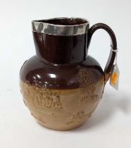 A 19th century Doulton Lambeth salt-glazed stoneware jar in the Harvest pattern, having a silver