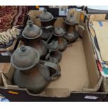 A graduated set of copper pots (7)