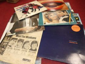 A collection of vintage 12" vinyl records, to include Michael Jackson Thriller and Boney M. Night