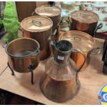 A set of three Leon Jarggi & Sons copper saucepans, flanked by cast brass handles, height 27cm,