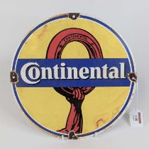 An enamel on metal advertising sign for Continental Tyres, dia. 30cm