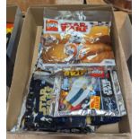 A collection of Lego Star Wars model kits