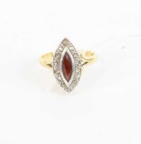 An 18ct gold, garnet and rose cut diamond set elliptical dress ring, 5.4g, size O