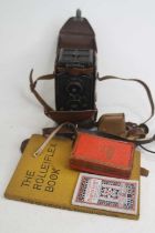 A Rolleiflex Compur compact camera, serial number 329330, in fitted leather case; together with