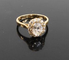 A modern 14ct yellow gold and cz set cluster ring, 4.1g, size O