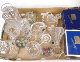 A collection of glassware, to include four Mats Jonasson lead crystal paperweights, two Swarovski