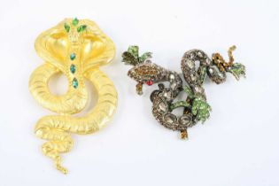 A gilt metal and green paste stone set big snake brooch, 11cm; together with another paste set snake