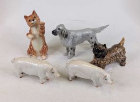 A collection of five various Beswick pottery animal figures, to include cat, dogs and pigs, the