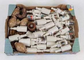 A collection of crested ware miniature bottles, to include Arcadia; together with other Beswick