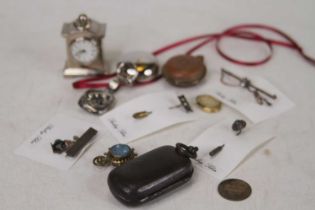 A collection of items to include a lady's gilt metal fob watch, chrome plated sovereign case, etc
