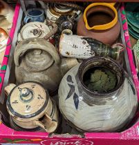 A collection of 20th century studio pottery, to include a bulbous vase glazed in tones of brown, h.