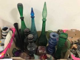 A collection of coloured glass vases and bottles Condition appears generally good with age-related