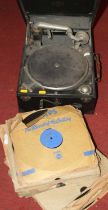 A vintage Columbia portable gramophone; together with a collection of records