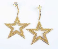 A pair of gilt metal and paste set five-point star ear pendants, with stud fittings, h.9.5cm