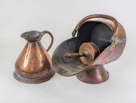 A 19th century copper gallon jug, together with a copper helmet shaped coal scuttle and scoop