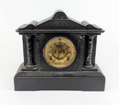 A Victorian black slate mantel clock of architectural form, the chapter ring showing Roman numeral