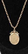 A 9ct gold belcher link neck chain with engraved 9ct gold oval picture locket, gross weight 9.5g (2)