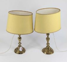 A pair of Rococo style brass table lamps, height including shade 49cm