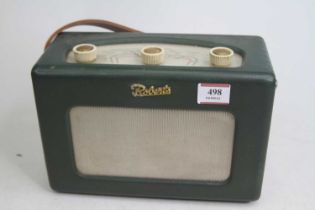A vintage Roberts radio, having green clad exterior, w.24cm