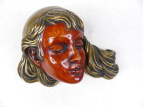 A German pottery wall mask, w.23cm