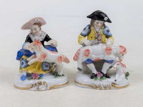 A pair of 19th century Samson porcelain figures, each shown in 18th century dress shearing sheep,