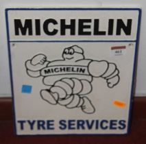 A painted cast iron advertising sign for Michelin Tyre Services, 30x24cm