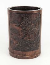 A Chinese bamboo brush pot, 19th century, carved with immortals viewing boats from a pagoda, four