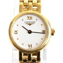 A lady's Longines Prestige 18ct yellow gold quartz wrist watch with round ¼ Roman dial and