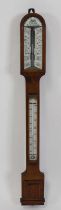 A Victorian oak Admiral Fitzroy's storm barometer by Negretti & Zambra, instrument makers to Her