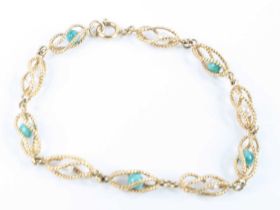 A 9ct yellow gold fancy openwork twist link bracelet, having five 3.65mm pearls alternating with