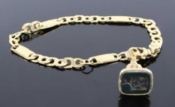 A 18ct yellow gold filed figure-of-eight and flat link bracelet, with carabiner clasp and fob