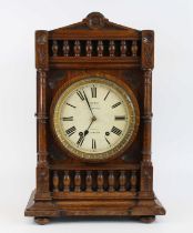 J. Sewill of Liverpool & London - a late Victorian oak bracket clock, the Aesthetic Movement