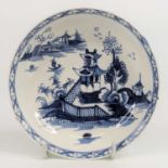 A Lowestoft porcelain saucer, circa 1770, decorated with a Chinese pagoda landscape, dia.12.5cm